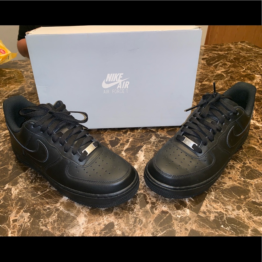 All black Nike Air Force Ones, men size 8